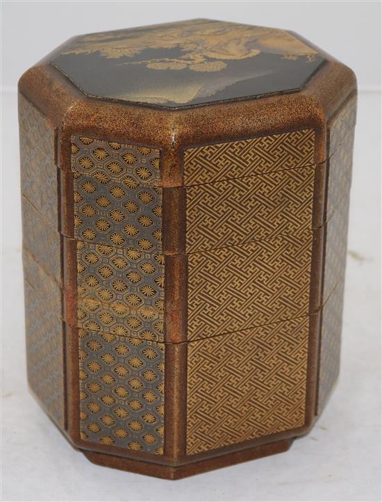 A Japanese togidashi gold lacquer jubako three tier box and cover, 18th century, 19.5cm, restorations